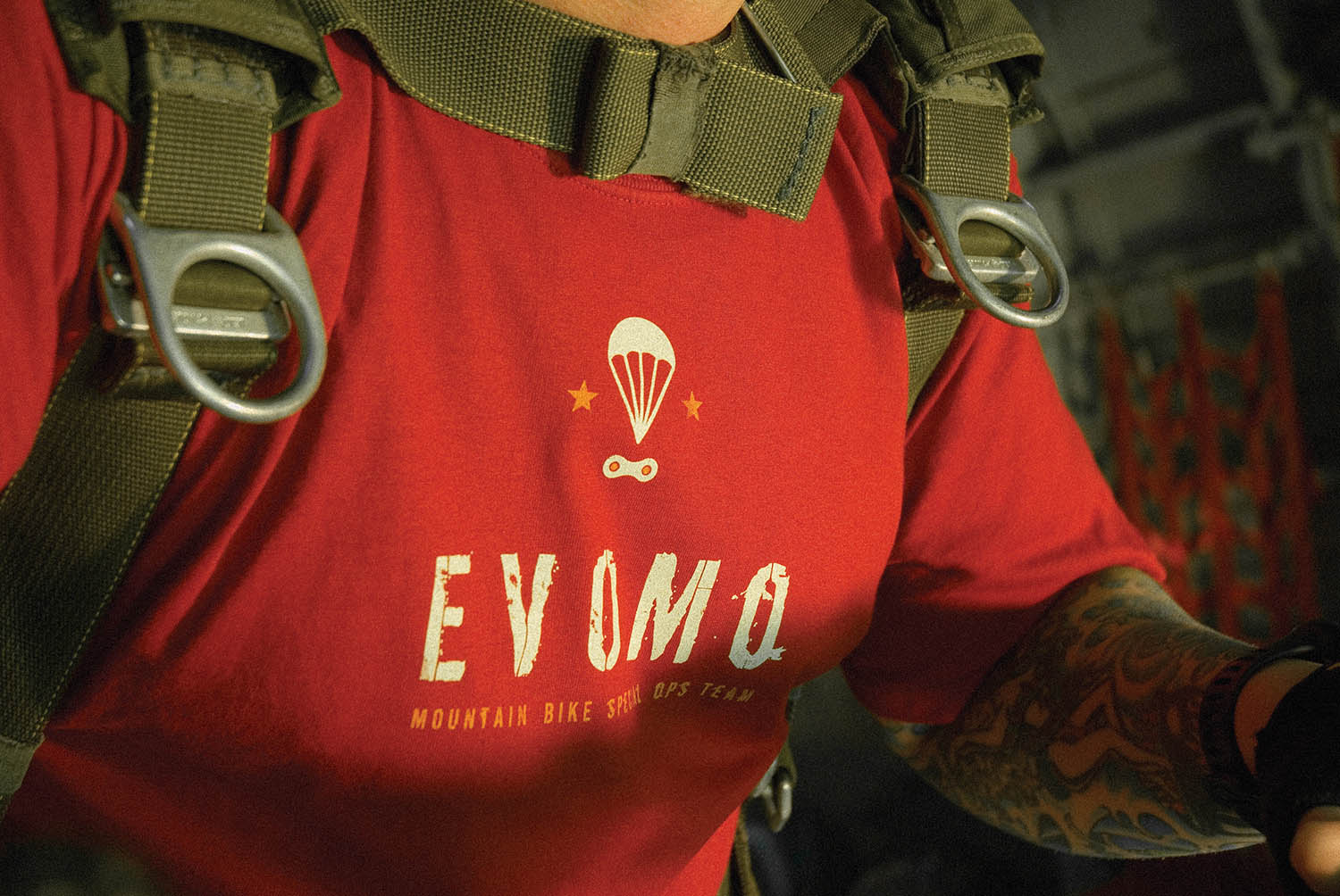 evomo mountain bike clothing c-123 aircraft advertising photo by bryan thombs shot on nikon